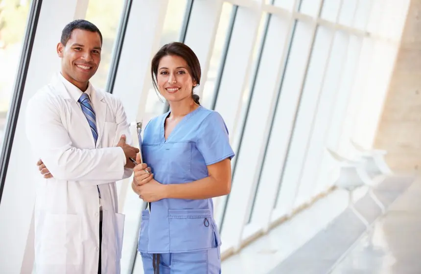 Medical Staff In Corridor Of Hospital